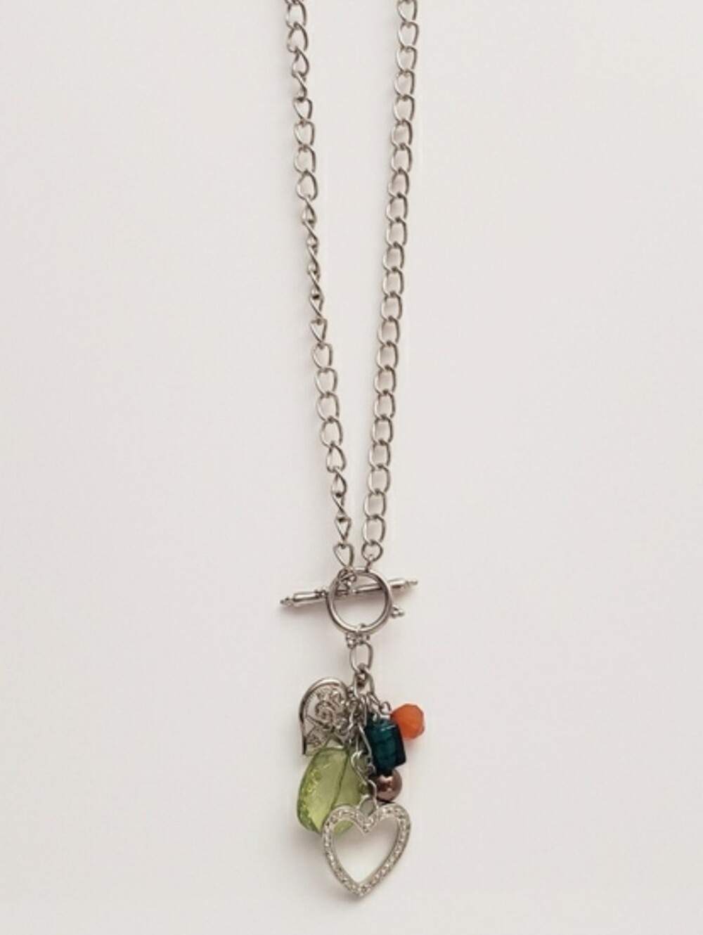 Two Silver Hearts With Mixed Charms Toggle/Bar Statement Necklace
